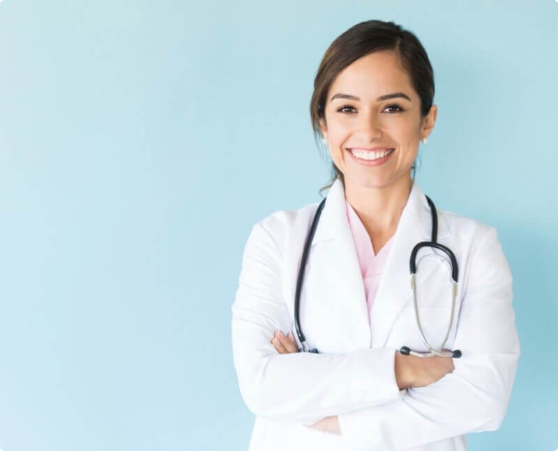 woman doctor crossing her arms and smiling